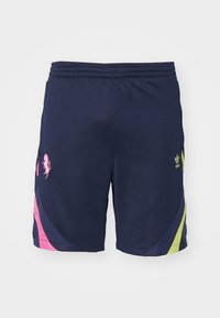 Tengerészkék sportnadrág, húzózsinórral a derékon, rózsaszín és lime zöld díszítő panelek, valamint egy nyomtatott logó a bal oldalon.