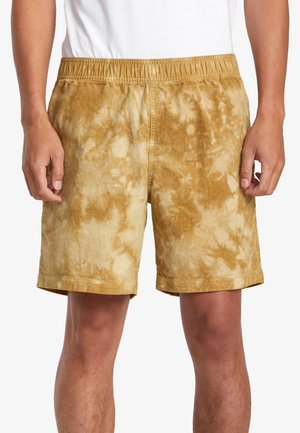 Tan corduroy shorts with a tie-dye pattern, featuring an elastic waistband and straight cut, reaching just above the knee.
