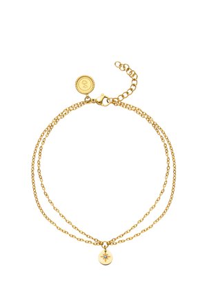 Pulsera de cadena de oro de doble capa con colgante de resplandor solar que incluye una pequeña piedra azul y un cierre ajustable con una etiqueta redonda.