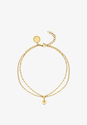 Pulsera de cadena de oro de doble capa con colgante de resplandor solar que incluye una pequeña piedra azul y un cierre ajustable con una etiqueta redonda.