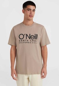 Béžové bavlněné tričko s velkým černým grafickým potiskem se textem "O'Neill SANTA CRUZ CALIFORNIA U.S.A." umístěným na přední straně. Krátké rukávy.