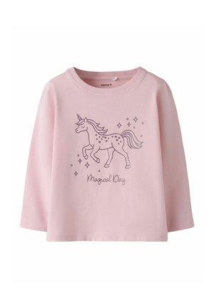 Light pink long-sleeve cotton shirt with a unicorn graphic and "Magical Day" text, featuring a round neckline and relaxed fit.