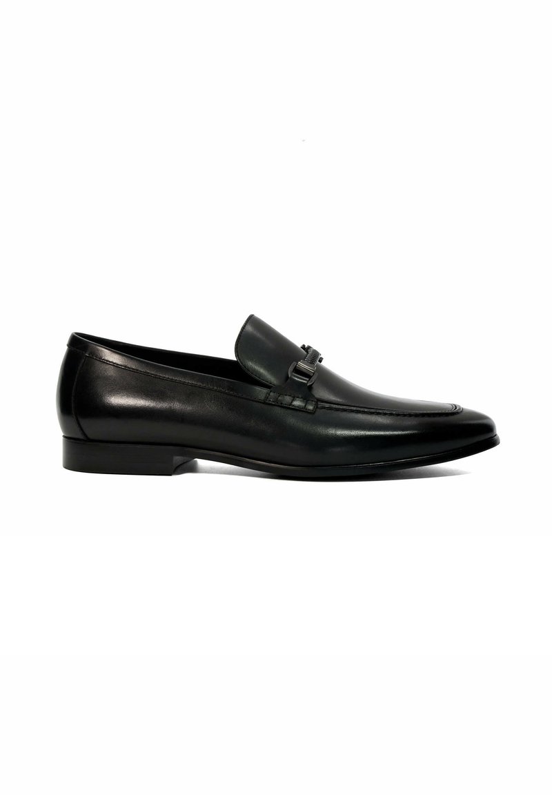 Black leather loafer with a low profile, featuring a decorative buckle detail, subtle stitching, and a smooth finish. Flat rubber sole.
