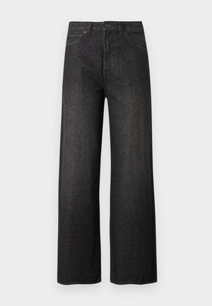 Vaqueros negros de pierna ancha y cintura alta, con bolsillos frontales, cierre de botones y trabillas para cinturón sobre un fondo claro y sencillo.