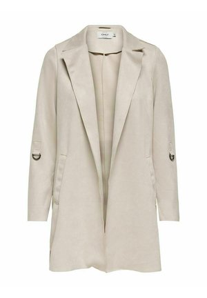 Μπεζ σουέτ εξωτερικό μπουφάν με γιακά με λαιμό, ανοιχτό μπροστινό μέρος, δύο πλευρικές τσέπες, και λεπτομέρειες στα μανίκια με κυκλική μεταλλική διακόσμηση.