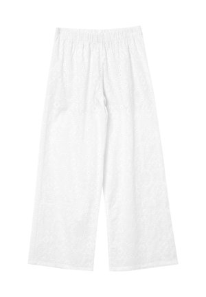 Pantalon blanc à jambes larges en coton, présentant un motif ajouré avec des découpes circulaires. Taille élastique pour un ajustement confortable.