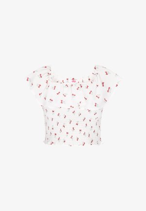Hvid kortærmet smocket cropped top med flæset halsudskæring og rød sløjfe samt grønne bladblomster.