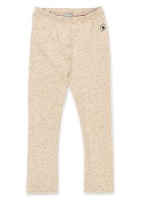 Beige leggings made of soft, textured fabric with colorful speckles. Features an elastic waistband and a small logo patch on the hip.