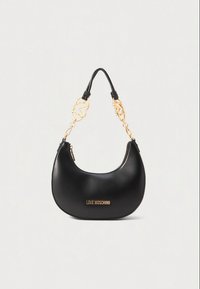 Black crescent-shaped handbag with gold chain accents and "LOVE MOSCHINO" logo on front, featuring a short black leather handle.