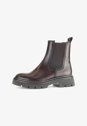 Braune Leder Chelsea-Stiefel mit elastischen Seitenteilen, runder Zehenpartie und klobigem Gummisohle. Mit Zuglasche und genähten Akzenten.