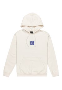 Haut à capuche beige clair avec une poche avant et un cordon de serrage réglable. Présente un motif floral bleu et teal sur la poitrine. Texture lisse.