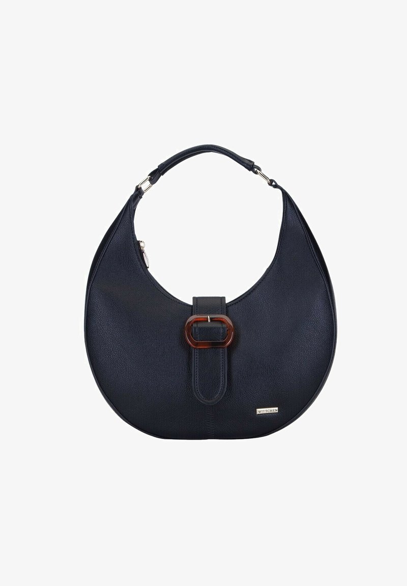 Sac hobo en cuir bleu marine, forme courbée, avec une fermeture à boucle circulaire marron et une courte anse avec des accents métalliques.