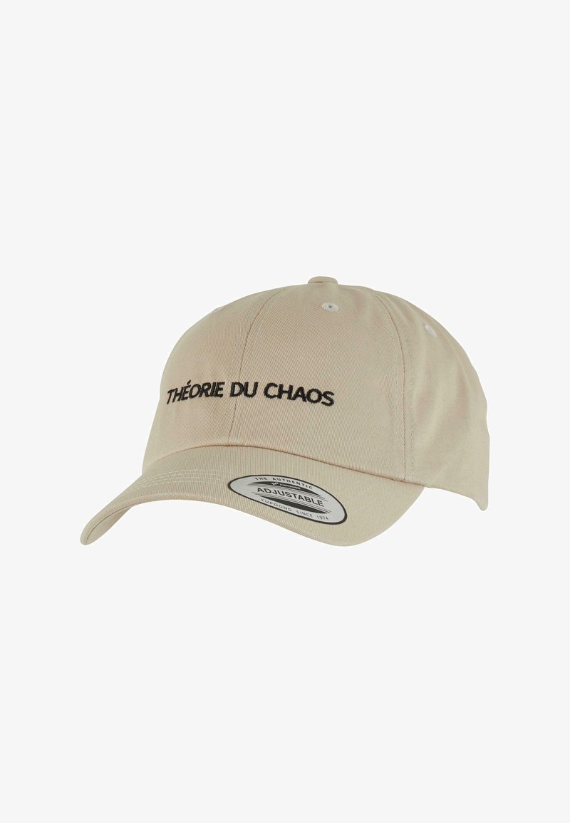Beige adjustable cap featuring black embroidered text "THÉORIE DU CHAOS." Soft fabric, curved brim, and ventilation holes on top.