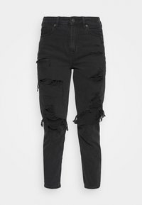 Jean en denim noir avec une coupe slim, des détails usés avec des effilochages et un design classique à cinq poches.