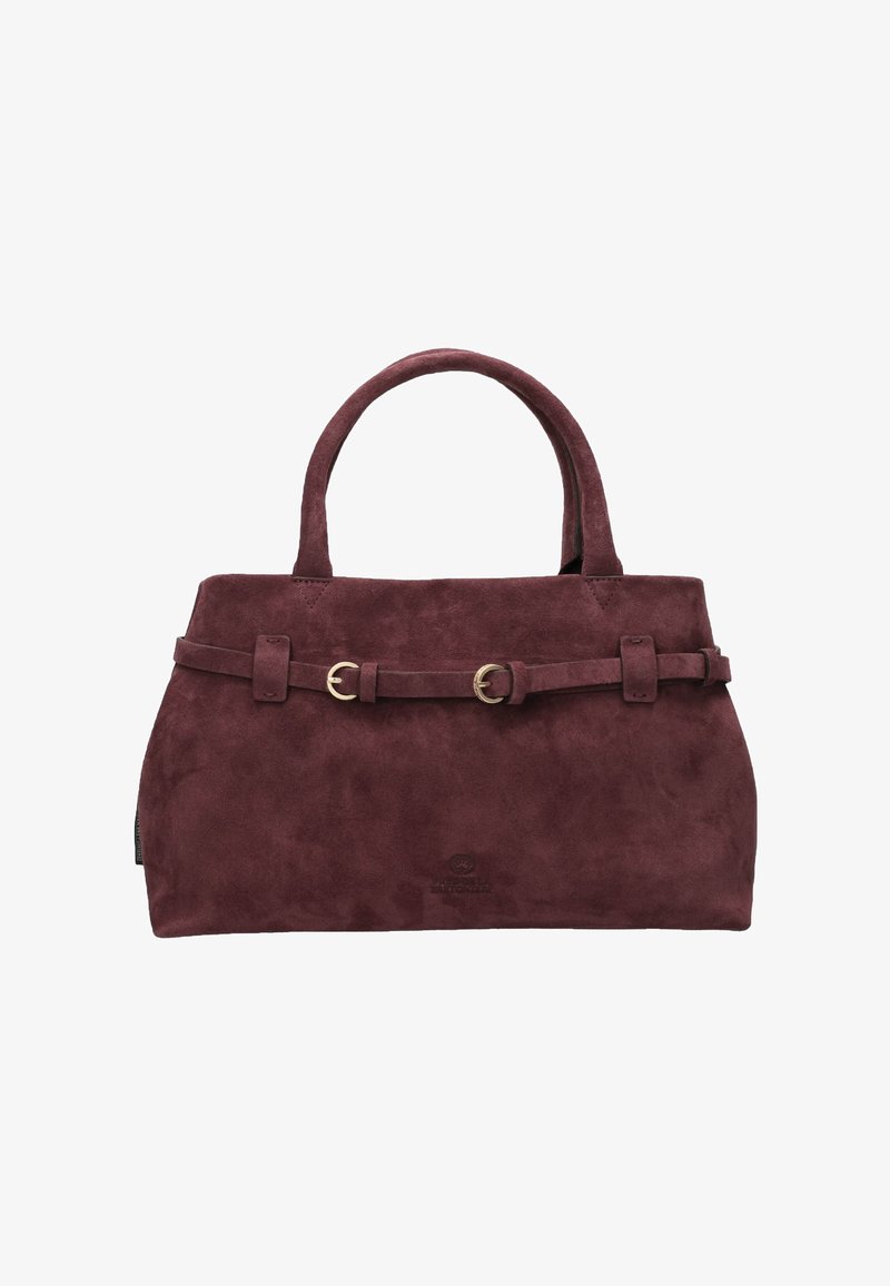 Suede handbag in dark burgundy with two top handles, gold hardware accents, and a belted detail across the front.