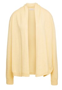 Cardigan giallo chiaro realizzato in tessuto morbido, con apertura frontale, maniche larghe e polsini e orlo a coste. Senza chiusure.