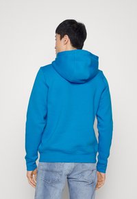 Tommy Hilfiger LOGO HOODY - Mikina s kapucňou - shocking blue