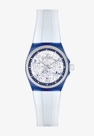 Orologio in silicone blu e trasparente con quadrante circolare bianco che presenta motivi testurizzati blu, indicatori dell'ora argentati e una visualizzazione della data alle tre.