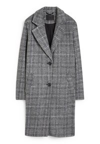 Harmaa ja valkoinen ruudullinen takki, jossa on lovellinen kaulus, yksittäinen napitus ja kaksi sivutaskua. Valmistettu teksturoidusta kudotusta kankaasta.