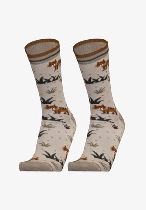 Beige Socken mit Tiger- und Grasmustern, braunem Bündchen, glatter Textur und grünen sowie braunen Akzenten im gesamten Design.