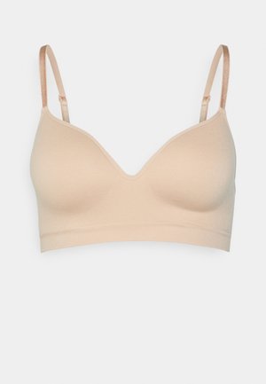 Beige, lightweight bralette with smooth fabric, a v-neckline, and adjustable satin straps. No underwire, providing a seamless look.