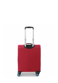 Red hard-shell suitcase with a retractable silver handle, four blue wheels, and a smooth texture. Minimalist design, rectangular shape.