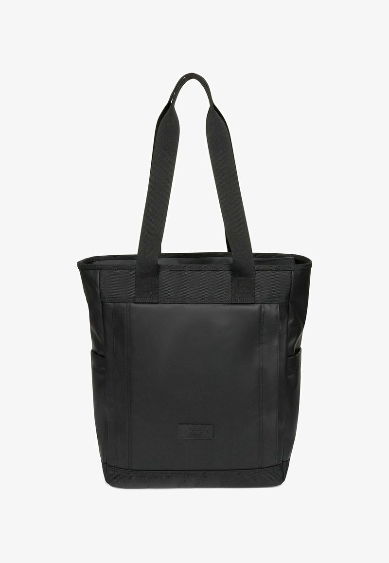 Sac fourre-tout noir avec longues anses, forme rectangulaire et logo discret de la marque au centre avant, conçu pour être porté à la main ou à l'épaule.