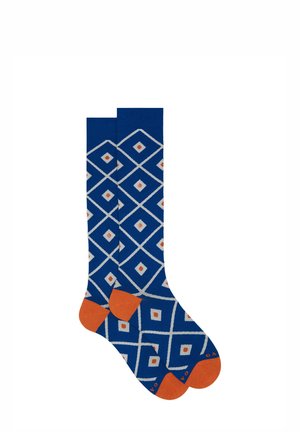 Knee-high socks in blue, featuring a diamond pattern in white and orange. Reinforced orange heels and toes add contrast. Made from soft fabric.