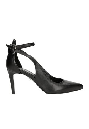Black leather high-heeled shoe with a pointed toe, ankle strap, and cut-out design on the side. Smooth texture and shiny finish.