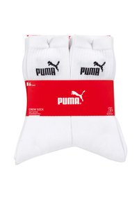 Weiße Crew-Socken aus weichem Baumwollmaterial, mit gepolsteter Sohle und einem schwarzen Puma-Logo. Das Paket enthält 6 Paar.