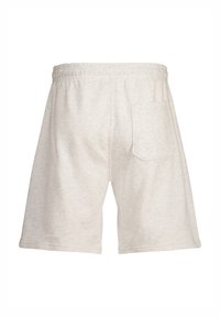 Vaaleanharmaat puuvillashortsit, joissa on joustava vyötärö. Niissä on yksi takatasku ja rento istuvuus. Pehmeä pinta, polven pituinen muotoilu.