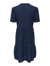 Robe bleu marine à manches courtes avec jupe à volants et col, vue de dos.