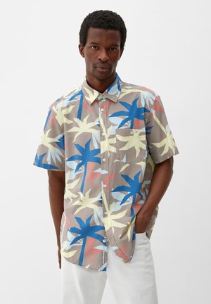Chemise transparente florale aquarelle à col nœud papillon en rose