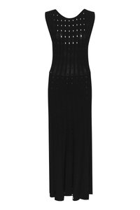 Abito maxi senza maniche di colore nero, realizzato in tessuto testurizzato con motivi a taglio verticale, caratterizzato da un collo rotondo e una silhouette che arriva fino al pavimento.