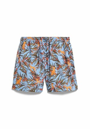Shorts bleus avec une taille élastique présentant un motif de chien orange et de branche feuillue verte avec des fleurs rouges.