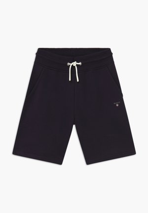 Donkerblauwe katoenmix shorts met een elastische tailleband, een crèmekleurige trekkoord, twee zijzakken en een klein logodetail op het been.