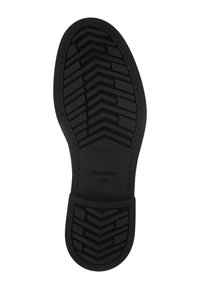 Černá gumová podrážka boty se zigzagovým vzorem, zaoblenou špičkou a zvýšenými akcenty podél okraje. Texturovaný, odolný povrch.