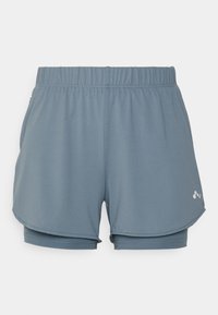 Idrottsshorts i en blå-grå nyans, med en strukturerad tyg, elastisk midja och innerskikt med sidoklipp för rörlighet.