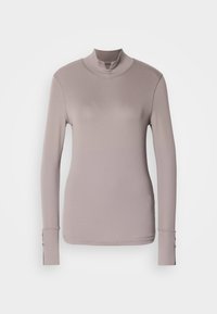 - Bluzka z długim rękawem