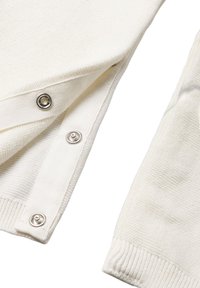 Witte gebreide cardigan met drukknopen, geribde mouwen en een textuurpatroon. Lichtgewicht stof met een gladde afwerking.