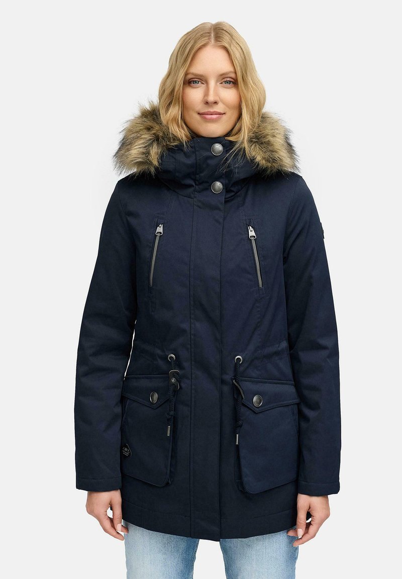Navy blue parka made of fabric with faux fur trim on hood. Features two zippered chest pockets, adjustable drawstrings, and snap closure.