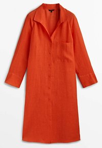 Långärmad, knappfront, knälång orange linnekjol med krage och en enda bröstficka.