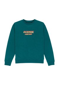 Teal sweatshirt med rund hals, ribbade ärmslut och nederkant. Har "DCSHOE COMPANY" logotyp i gul och röd text över bröstet.