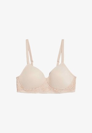 Beige padded bra with lace trim along the edge, adjustable straps, and smooth fabric. Features a subtle textured design on the band.