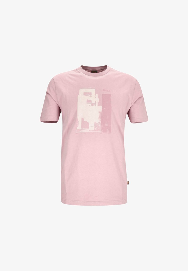 Light pink cotton t-shirt with short sleeves. Features a graphic print in white and dark gray on the front. Classic round neckline.