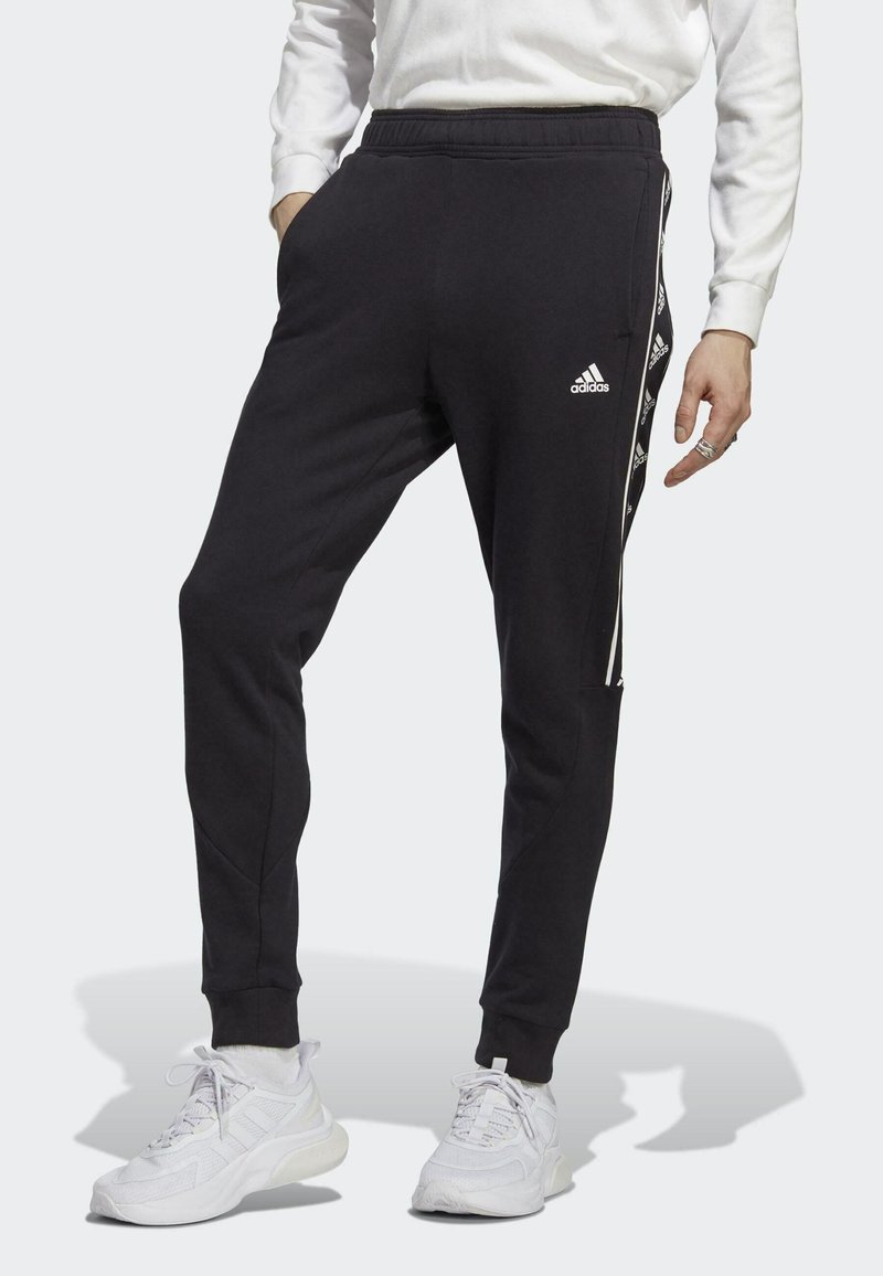 adidas Sportswear Tracksuit bottoms black Zalando.co.uk