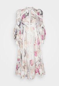 Robe à imprimé floral en tissu transparent, avec des manches bouffantes, un décolleté en trou de serrure et des détails blancs. Motifs remarquables en rose et gris.