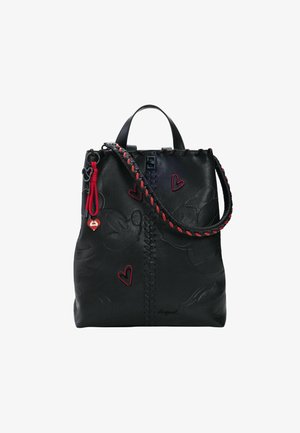Black leather handbag featuring embossed Mickey Mouse designs and red heart accents. It has dual handles and a braided strap with a tassel.