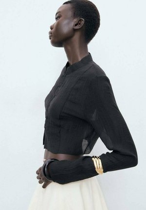 Blusa - black