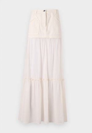 Gonna lunga a strati con un top aderente in tessuto crema, presenta due tasche frontali, una chiusura con bottoni e un orlo arricciato.